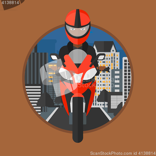 Image of Woman riding motorcycle.