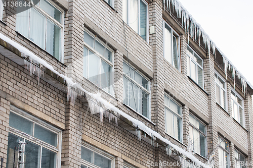 Image of icicles on building or living house facade