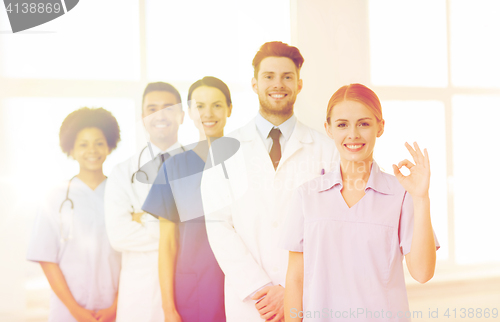 Image of group of doctors and nurses at hospital