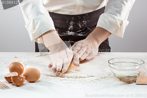 Image of Hands kneading a dough