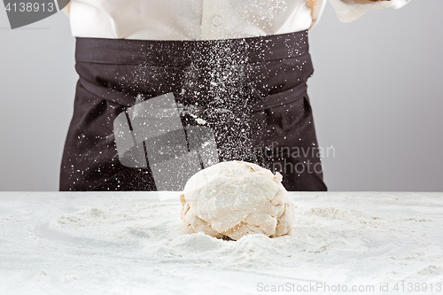 Image of Hands kneading a dough