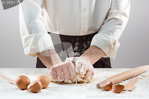 Image of Hands kneading a dough