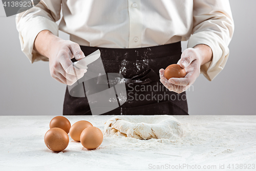 Image of Hands kneading a dough