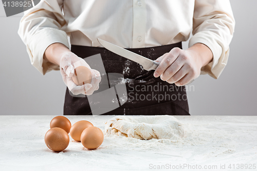 Image of Hands kneading a dough