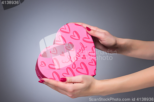 Image of Hands giving or receiving a present