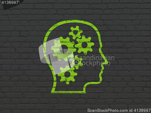 Image of Data concept: Head With Gears on wall background