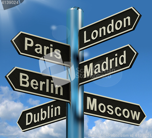 Image of London Paris Madrid Berlin Signpost Showing Europe Travel Touris