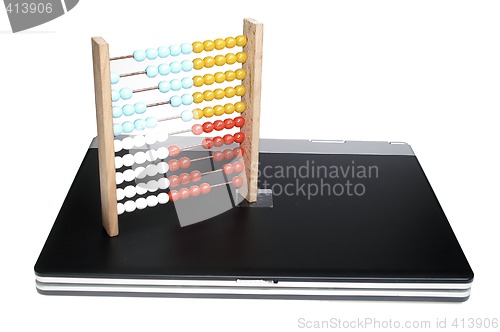 Image of Laptop and abacus