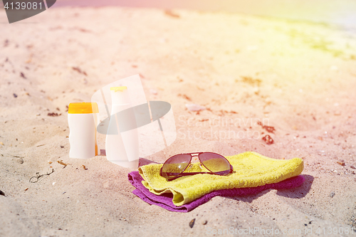 Image of Beach accessories in the sand