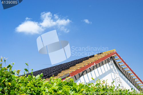 Image of Roof renovation with black tiles