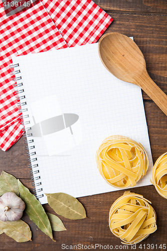 Image of blank paper with pasta, pepper and spices