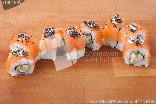 Image of Closeup japanese sushi on wooden plate