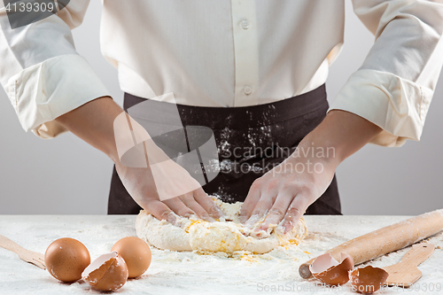 Image of Hands kneading a dough