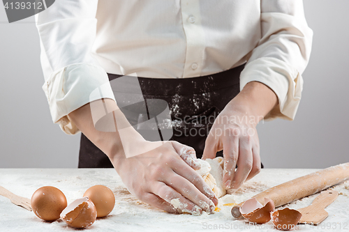 Image of Hands kneading a dough