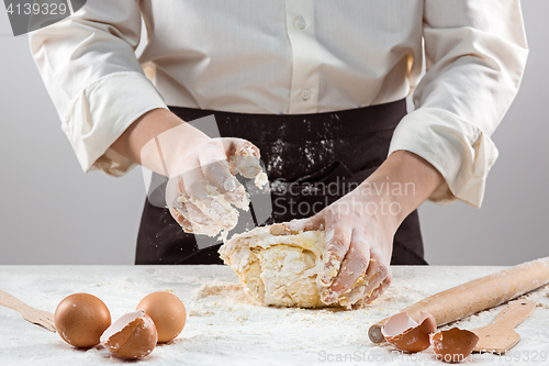 Image of Hands kneading a dough