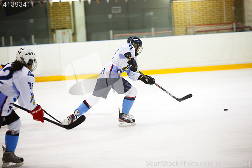 Image of Moscow, Russia - January, 07, 2017: Female amateur hockey leage LHL-77. Game between female hockey team \"Grad\" and female hockey team \"Atlant\".