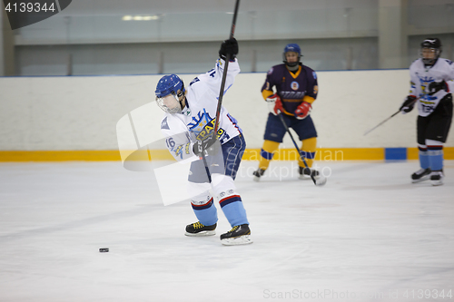Image of Moscow, Russia - January, 07, 2017: Female amateur hockey leage LHL-77. Game between female hockey team \"Grad\" and female hockey team \"Atlant\".