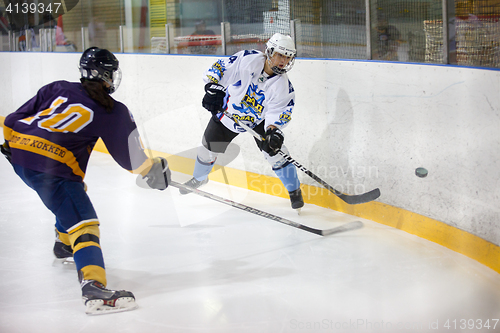 Image of Moscow, Russia - January, 07, 2017: Female amateur hockey leage LHL-77. Game between female hockey team \"Grad\" and female hockey team \"Atlant\".