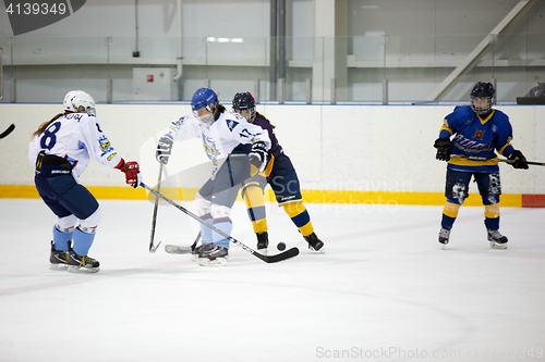 Image of Moscow, Russia - January, 07, 2017: Female amateur hockey leage LHL-77. Game between female hockey team \"Grad\" and female hockey team \"Atlant\".