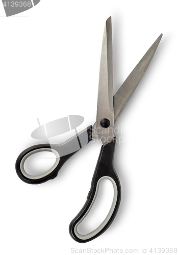 Image of Disclosed big scissors with black handles