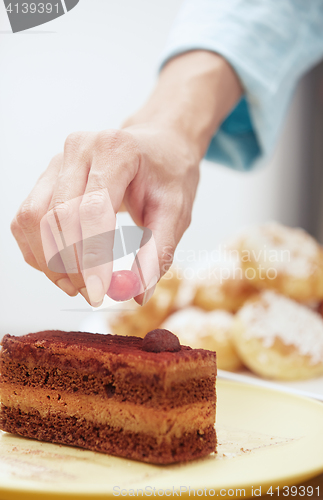 Image of Woman preparing chocolate cake