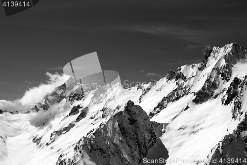 Image of Black and white snow mountains in wind day