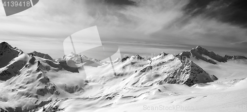 Image of Black and white panorama of Caucasus Mountains in snow winter ev