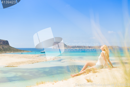 Image of Relaxed Happy Woman Enjoying Sun on Vacations.