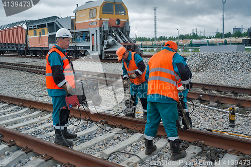 Image of Railway workers repairing railway