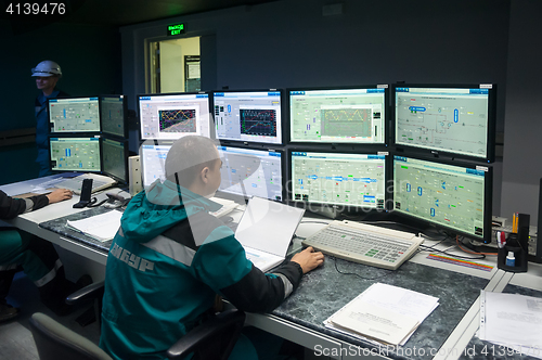 Image of Engineers in control room of Tobolsk Polymer
