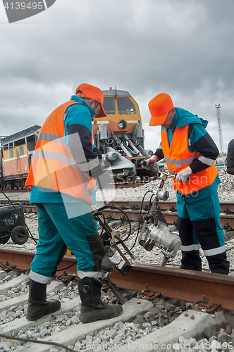 Image of Railway workers repairing rail