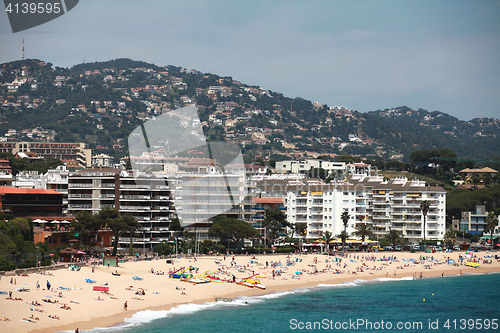 Image of  beach and the hotel's beach resort