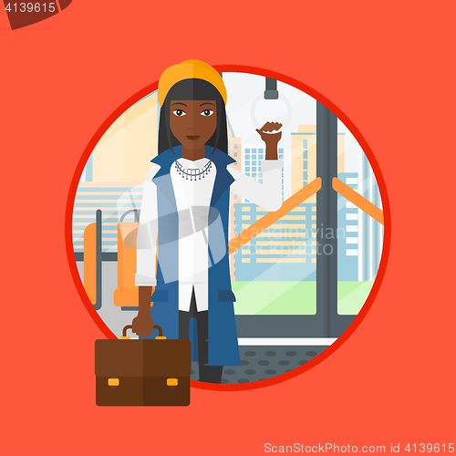 Image of Woman traveling by public transport.