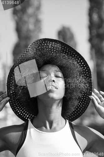 Image of Close up portrait of a beautiful young african american woman sm