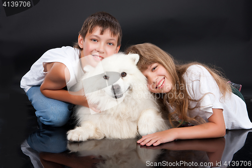 Image of Girl, Boy And Dog