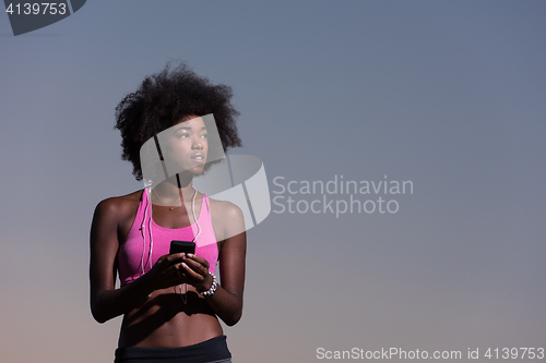 Image of young african american woman in nature