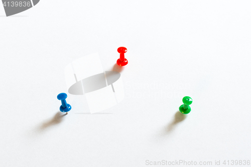 Image of Thumbtack pins on white