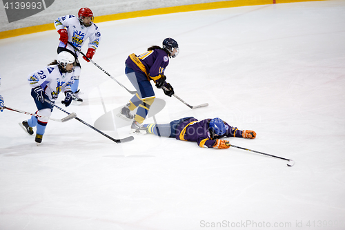 Image of Moscow, Russia - January, 07, 2017: Female amateur hockey leage LHL-77. Game between female hockey team \"Grad\" and female hockey team \"Atlant\".