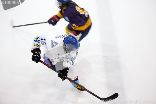 Image of Moscow, Russia - January, 07, 2017: Female amateur hockey leage LHL-77. Game between female hockey team \"Grad\" and female hockey team \"Atlant\".