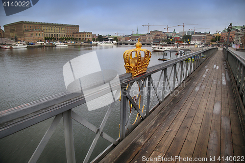 Image of Skeppsholmsbron (Skeppsholm Bridge) with Golden Crown on a bridg