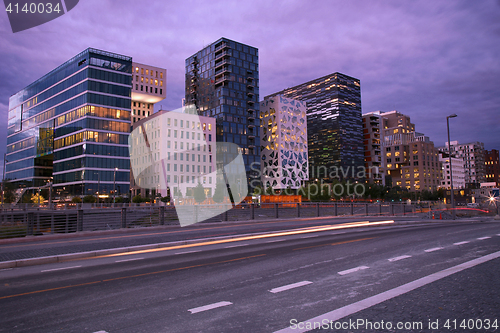 Image of moving car with blur light through Dronning Eufemias gate street