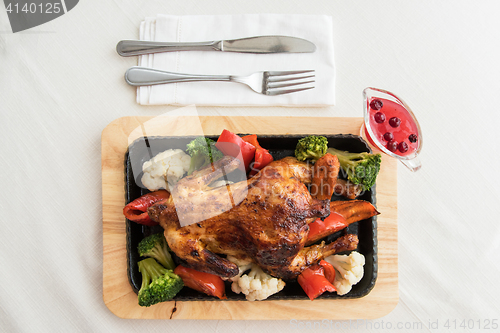 Image of Roasted chicken with vegetables.