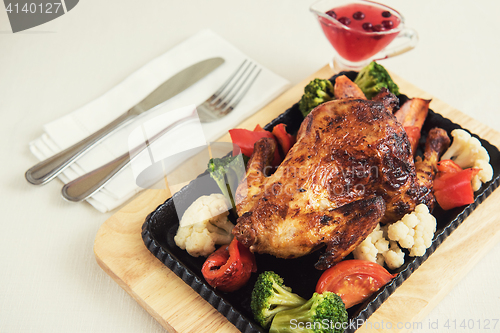 Image of Roasted chicken with vegetables.