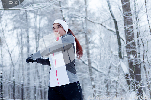 Image of Morning gymnastics of athletic brunette