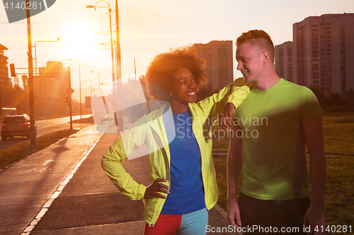 Image of Portrait of romantic pretty couple on fitness session, outside t