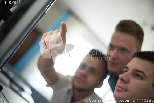 Image of a group of graphic designers at work