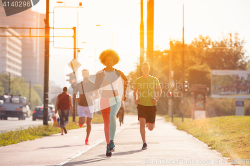 Image of multiethnic group of people on the jogging