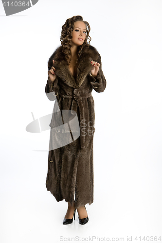 Image of Young Attractive Woman In Fur Coat