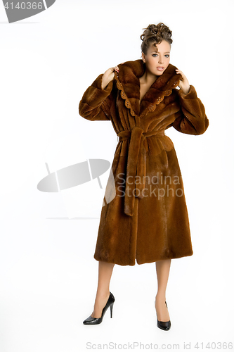 Image of Young Attractive Woman In Fur Coat