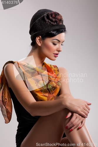 Image of Young Beautiful Woman in Fashionable Clothing